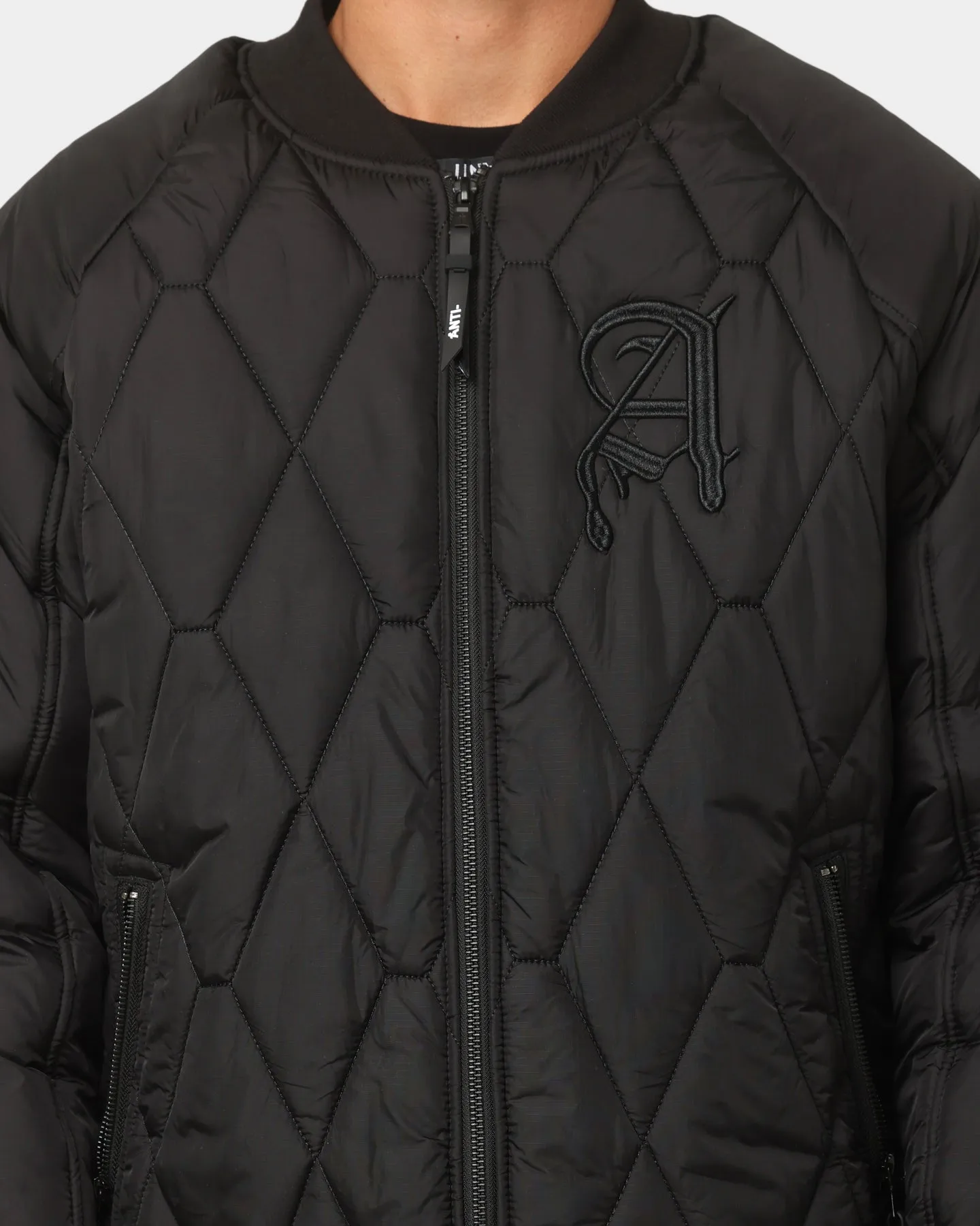 The Anti Order Corvus Quilted Bomber Jacket Black/White